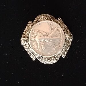 Silver and Marcasite Pendant/Pin with a 1942 Walking Liberty Half Dollar.